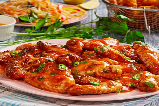 Chicken in chilly sauce with Jollof Rice 